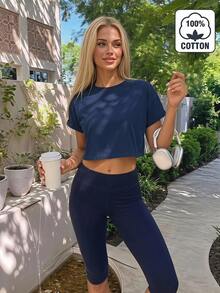 Fluxe تي شيرت نسائي كاجوال بلون موحد محبوك بياقة دائرية وأكمام قصيرة وقصة فضفاضة قصيرة - أزرق بحري - مشاهدة 4