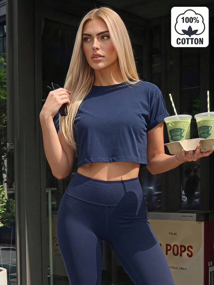 Fluxe تي شيرت نسائي كاجوال بلون موحد محبوك بياقة دائرية وأكمام قصيرة وقصة فضفاضة قصيرة - أزرق بحري - مشاهدة 1