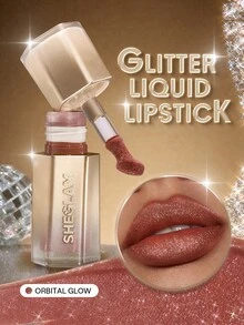 SHEGLAM Stardust Swipe أحمر شفاه سائل بلمعة جليتر-525 Orbital Glow ملمع شفاه لمعة جليتر فورية لمسة نهائية مطفية طويلة الأمد مقاوم للانتقال ومقاوم للتلطيخ ماركة تجميل ومكياج للنساء والفتيات - 525 Orbital Glow - مشاهدة 1