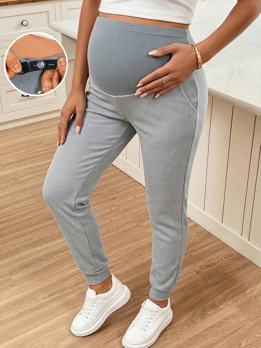 SHEIN بنطال رياضي طويل ضيق بتصميم بسيط مع جيوب للحوامل، مناسب للربيع والخريف