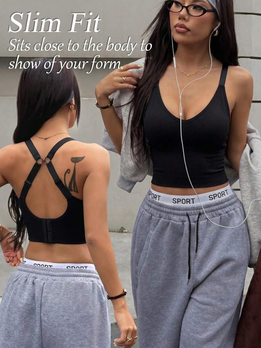 SHEIN Sports Women's Solid Color Back Cutout Daily Fitness Sports Bra - Black - View 1
