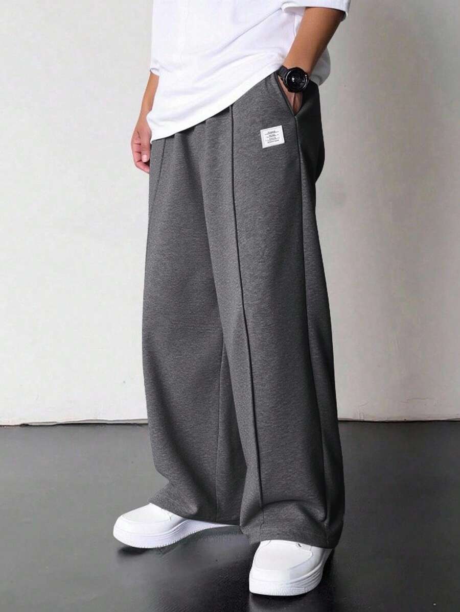 SHEIN 青少年男孩純色極簡街頭風寬鬆百搭牙籤摺痕長款運動長褲,海灘運動款,秋冬灰色 - 深灰色 - 查看 1