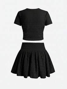 SHEIN 兒童青少年女孩休閒可愛粉色針織紋理短袖T恤與裙子套裝，短版上衣與百褶迷你裙，裙褲迷你裙T恤套裝 粉色 - 黑色 - 查看 2
