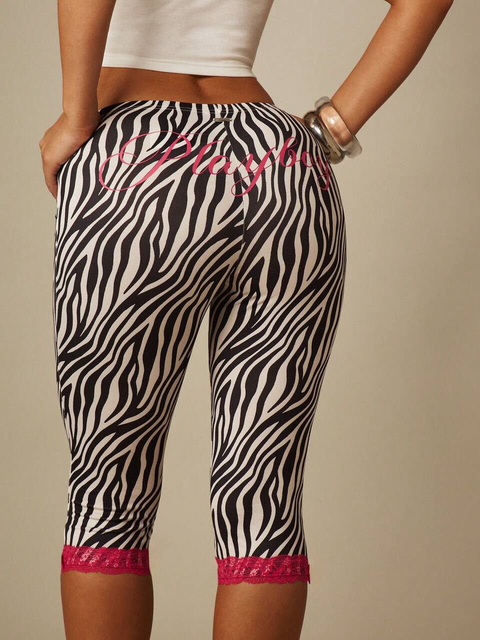 Missguided x Playboy Zebra Print Capri Leggings With Hot Pink Lace Trim And Bow Detail