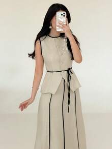 Yasmeen Edit Yasmeen Edit 女款休閒兩件套：撞色單排扣上衣與裙子夏季無袖撞色，法式優雅套裝，高腰顯瘦，休閒海灘，歐美風格，寬裙與開衩設計，時尚百搭度假穿搭。女款優雅套裝最新款高品質裙子女裝套裝奢華套裝，女款夏季套裝春季杏色撞色A字裙套裝，優雅修身腰部設計女款優雅套裝端莊無袖套裝附腰帶長A字裙套裝夏季優雅休閒女款套裝，V領無袖對比滾邊A字裙套裝，辦公室工作裝婚禮賓客穿搭，米色黑色優雅夏季裙子女款，女款夏季套裝，女款正式套裝，夏季衣物，女款夏季穿搭，商務休閒套裝野餐裙女士女士套裝女款現代套裝女款現代裙子高品質套裝裙子女款優雅套裝新品上市 - 彩色 - 查看 2