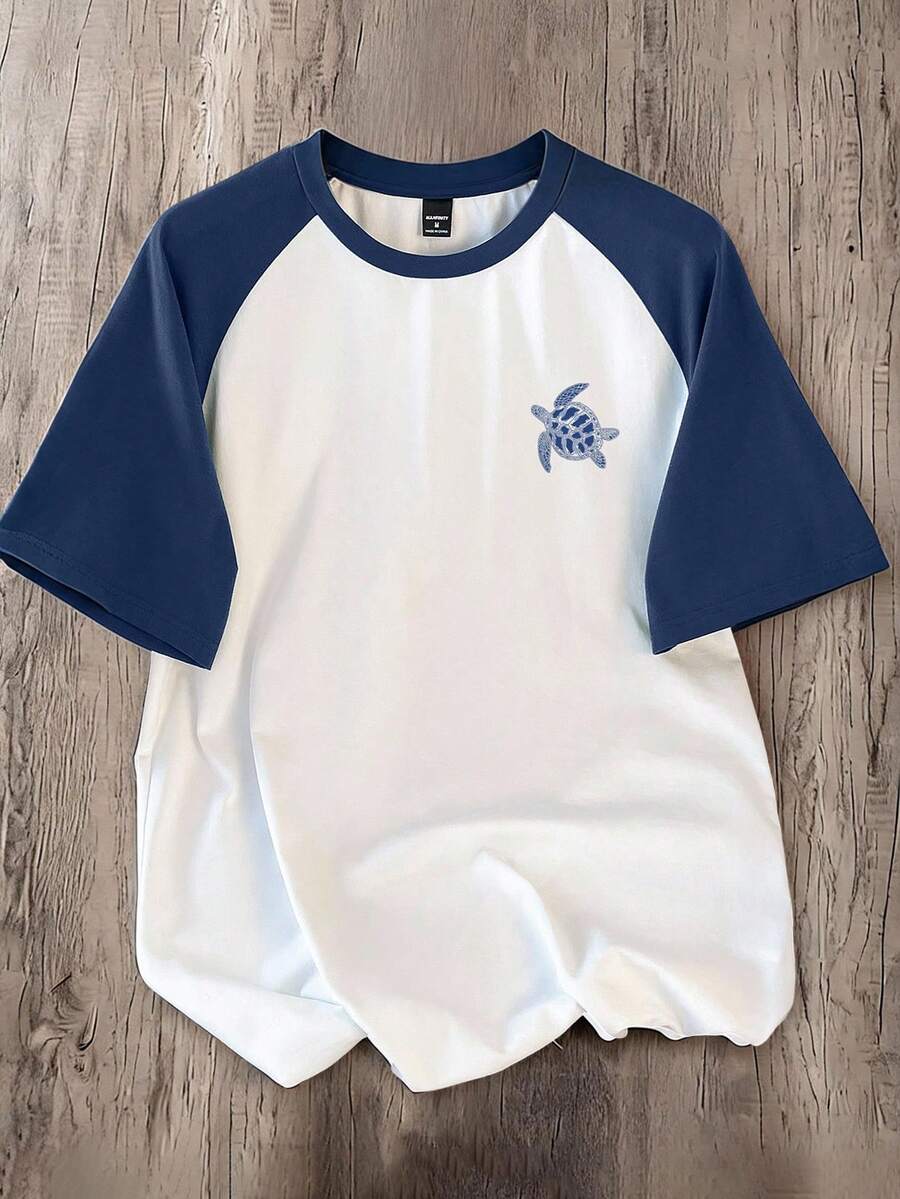 Manfinity Joysei Camiseta de manga raglan para hombre con diseño de tortuga marina, en patchwork azul marino y blanco, adecuada para el verano - Multicolor - Ver 1