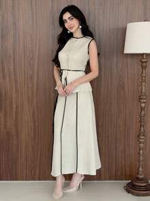 Yasmeen Edit Yasmeen Edit 女款休閒兩件套：撞色單排扣上衣與裙子夏季無袖撞色，法式優雅套裝，高腰顯瘦，休閒海灘，歐美風格，寬裙與開衩設計，時尚百搭度假穿搭。女款優雅套裝最新款高品質裙子女裝套裝奢華套裝，女款夏季套裝春季杏色撞色A字裙套裝，優雅修身腰部設計女款優雅套裝端莊無袖套裝附腰帶長A字裙套裝夏季優雅休閒女款套裝，V領無袖對比滾邊A字裙套裝，辦公室工作裝婚禮賓客穿搭，米色黑色優雅夏季裙子女款，女款夏季套裝，女款正式套裝，夏季衣物，女款夏季穿搭，商務休閒套裝野餐裙女士女士套裝女款現代套裝女款現代裙子高品質套裝裙子女款優雅套裝新品上市 - 彩色 - 查看 4