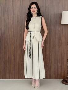 Yasmeen Edit Yasmeen Edit 女款休閒兩件套：撞色單排扣上衣與裙子夏季無袖撞色，法式優雅套裝，高腰顯瘦，休閒海灘，歐美風格，寬裙與開衩設計，時尚百搭度假穿搭。女款優雅套裝最新款高品質裙子女裝套裝奢華套裝，女款夏季套裝春季杏色撞色A字裙套裝，優雅修身腰部設計女款優雅套裝端莊無袖套裝附腰帶長A字裙套裝夏季優雅休閒女款套裝，V領無袖對比滾邊A字裙套裝，辦公室工作裝婚禮賓客穿搭，米色黑色優雅夏季裙子女款，女款夏季套裝，女款正式套裝，夏季衣物，女款夏季穿搭，商務休閒套裝野餐裙女士女士套裝女款現代套裝女款現代裙子高品質套裝裙子女款優雅套裝新品上市 - 彩色 - 查看 5