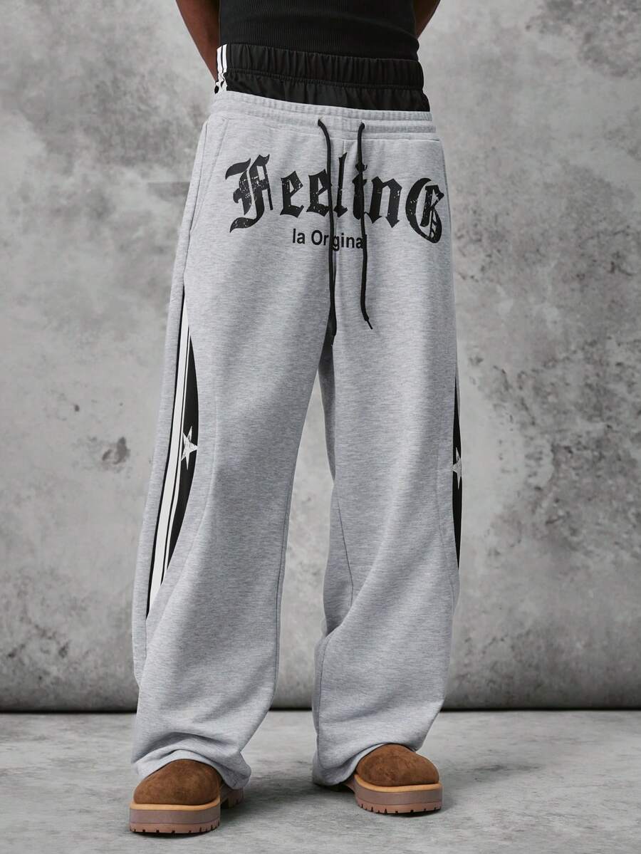 STYNVO Pantalones de chándal casuales versátiles de uso diario con cintura con cordón y patrón de letras para hombre - Gris - Ver 1