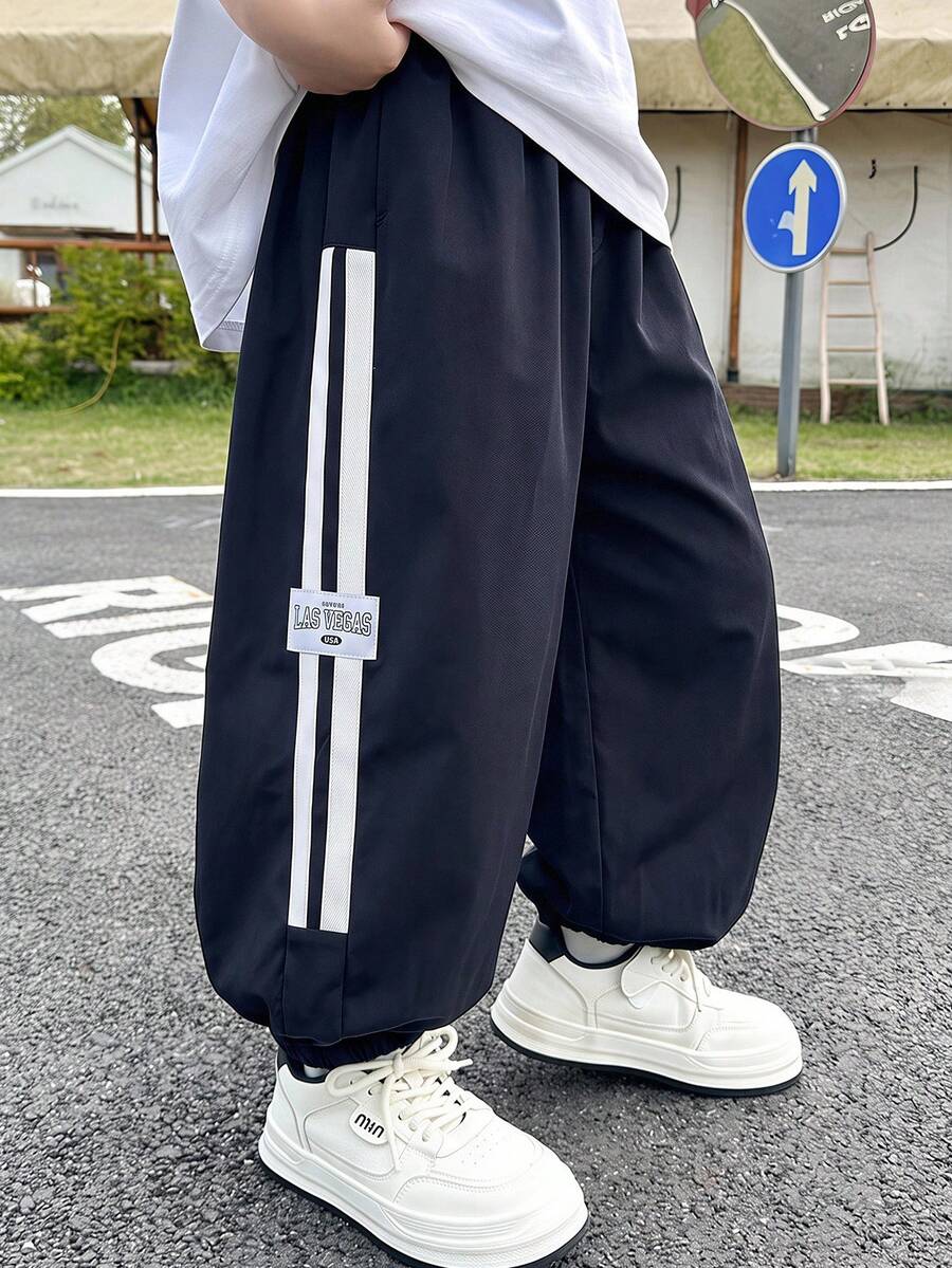 SHEIN 1件兒童青少年男孩休閒運動風織帶圖案拼接寬鬆錐形純色工裝褲，適合通勤、上學、日常休閒、度假、旅行、運動，四季皆宜