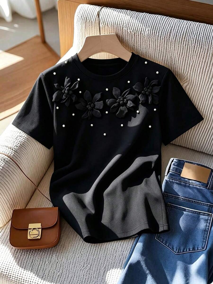 GlowEve CURVE Modisches Damen-T-Shirt in Große Größen mit Rundhalsausschnitt, 3D-Blumen-Perlenverzierung, Kurzarm, elegantes Top für den Arbeitsalltag, Frühling/Sommer - Schwarz - Übersicht 1