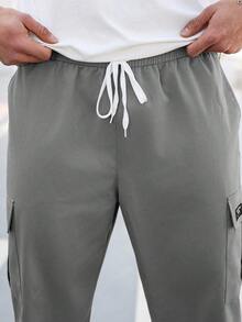 Manfinity Homme Pantalones cargo casuales con cordón en la cintura y gráfico de letras para hombres de talla grande - Gris - Ver 3