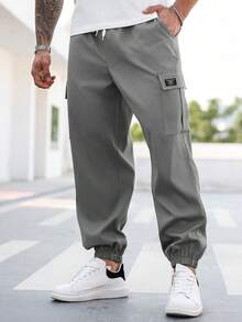 Manfinity Homme Pantalones cargo casuales con cordón en la cintura y gráfico de letras para hombres de talla grande - Gris - Ver 1