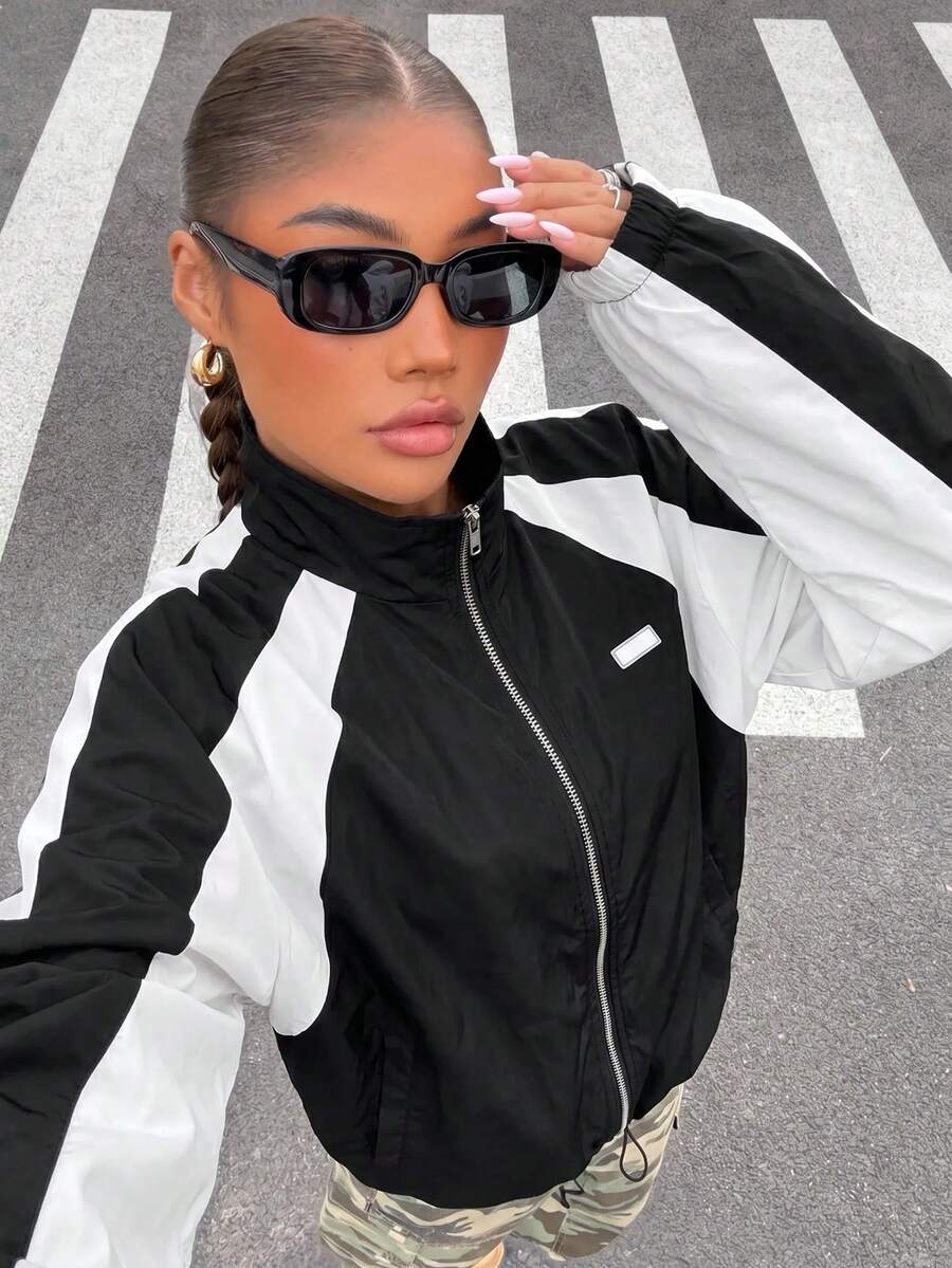 SHEIN EZwear Chaqueta con cremallera, mangas raglán y dobladillo con cordón, diseño de bloques de color para otoño/invierno - Blanco y Negro - Ver 1