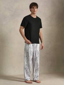 EverLounge Men's Solid Color Crew Neck Short Sleeve Top And Long Pants Loungewear Set - Black - View 1
