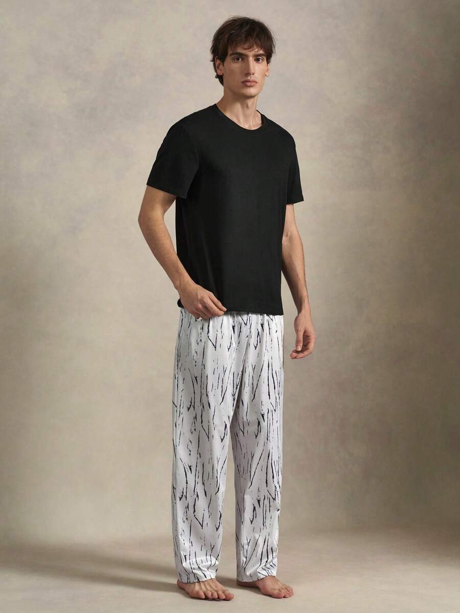EverLounge Men's Solid Color Crew Neck Short Sleeve Top And Long Pants Loungewear Set - Black - View 1
