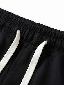 STYNVO Celana Harem Pria dengan Cetakan Huruf, Warna Kontras, Saku, dan Tali Serut di Pinggang - Hitam - View 4