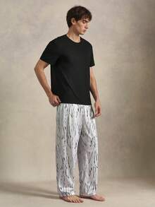 EverLounge Men's Solid Color Crew Neck Short Sleeve Top And Long Pants Loungewear Set - Black - View 3