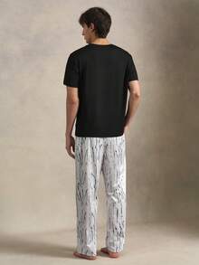EverLounge Men's Solid Color Crew Neck Short Sleeve Top And Long Pants Loungewear Set - Black - View 2