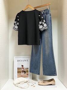 Muvela 女款夏季休閒花卉刺繡前綁帶上衣 - 黑與白 - 查看 3