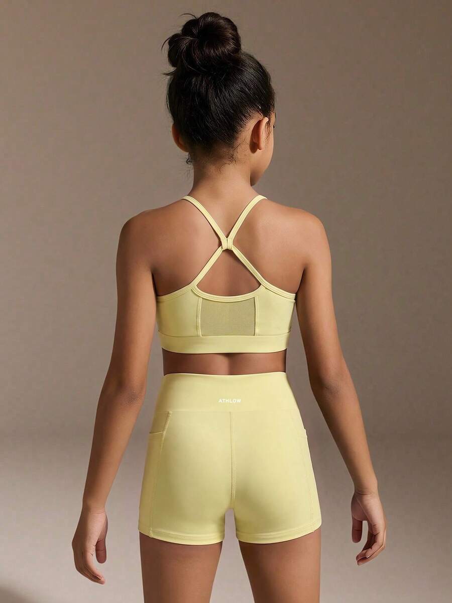 SHEIN Tween Girls Yellow Sports Set, Mesh Patchwork Design Sports Top + Sports Shorts, Tight High Elastic Fabric Comfortable Fit 4-Way Stretch, Glowmode - Yellow - View 1