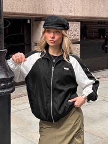 SHEIN EZwear Chaqueta con cremallera, mangas raglán y dobladillo con cordón, diseño de bloques de color para otoño/invierno - Blanco y Negro - Ver 6