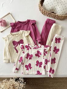 SHEIN Conjunto de 6 piezas para bebé niña con camiseta de cuello redondo, ribete de volantes, estampado de lazo en contraste, punto acanalado cepillado y color liso, y pantalones largos - Multicolor - Ver 5
