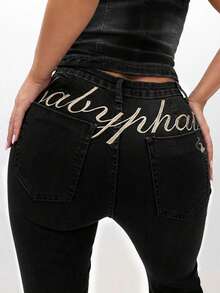 BABYPHAT 低腰彈性丹寧喇叭褲，附標誌性 Logo 腰帶，適合休閒與夜生活場合 - 黑色 - 查看 8