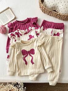 SHEIN Conjunto de 6 piezas para bebé niña con camiseta de cuello redondo, ribete de volantes, estampado de lazo en contraste, punto acanalado cepillado y color liso, y pantalones largos - Multicolor - Ver 4