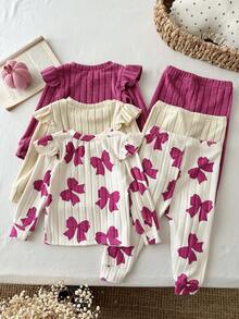 SHEIN Conjunto de 6 piezas para bebé niña con camiseta de cuello redondo, ribete de volantes, estampado de lazo en contraste, punto acanalado cepillado y color liso, y pantalones largos - Multicolor - Ver 2