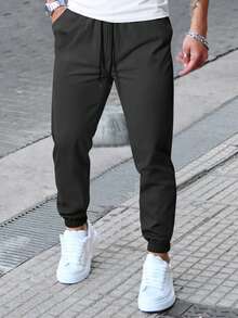 Manfinity Homme Pantalones casuales de unicolor con cordón en la cintura y bolsillos, otoño - Negro - Ver 3
