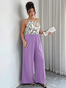 Elenzga جمبسوت نسائي مقاس كبير للربيع/الصيف أنيق بتصميم لف وربط مخطط بألوان متباينة بقصة فضفاضة وساق مستقيمة - متعدد الألوان - مشاهدة 4