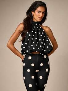 AiiRZ Crop Top Polkadot Model Halter Neck dengan Hem Gelembung dan Punggung Terbuka, Siluet Mengalir untuk Pesta Musim Panas - Hitam dan Putih - View 1