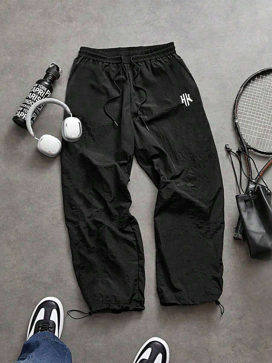 Sport MetroGents Celana Panjang Olahraga Pria Ukuran Besar dengan Motif Huruf dan Tali Serut di Pinggang - Hitam - View 1