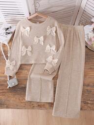 Elladie kids Top solto de manga comprida para rapariga grande, estilo coreano suave, em cetim 3D com laço decorativo, cor damasco claro, textura canelada vertical, macio e liso, gola redonda, com vestido de cintura alta