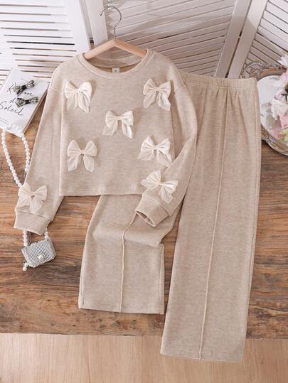 Elladie kids Tween Girls' Gentle Korean Style 3D Satin Bow Decor Light Apricot Vertical Ribbed Texture Soft Smooth Round Neck Loose Long Sleeve Top And High Waist Dr