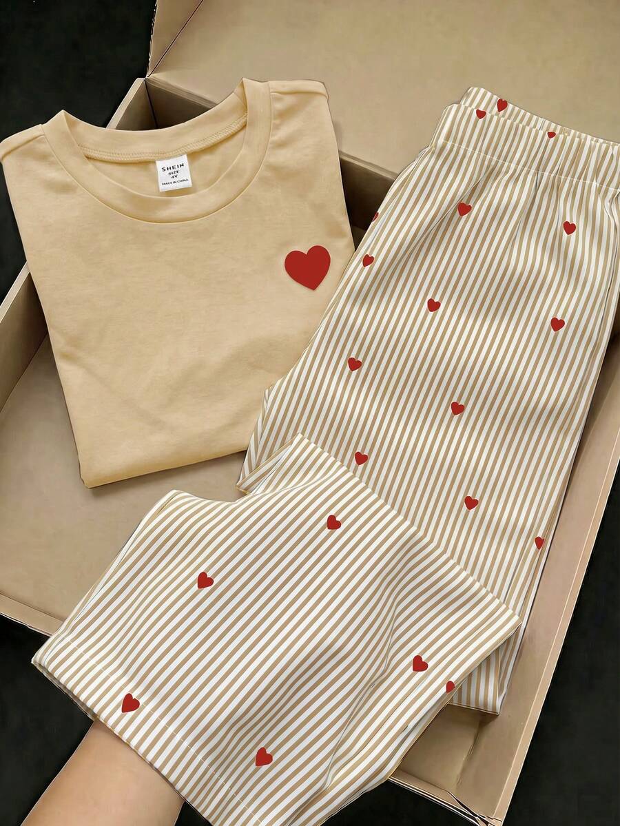 SHEIN Elladie kids 2件組基礎休閒懶人純色套裝,圓領短袖T恤搭配條紋布料直筒長褲,適合日常出遊與多種場合,春夏四季兒童舒適日常夏日穿搭 - 杏色 - 查看 1