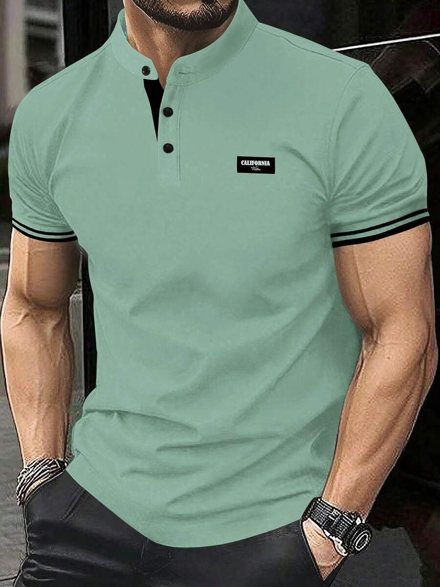 Manfinity Homme Camisa polo de mezclilla con rayas, bloques de color y medio cierre para hombre - verde menta - Ver 1