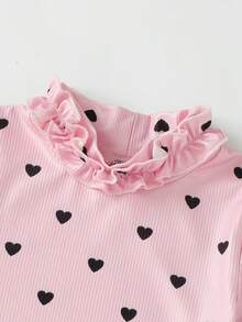 Elladie kids 女童高領針織底層上衣，採用柔軟舒適的針織面料，甜美荷葉邊飾邊裝飾增添優雅氣息，適合多種層次搭配與外套組合，完美適用休閒日常穿著、戶外出遊與戶外活動，適合秋冬季節 - 彩色 - 查看 7