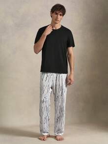 EverLounge Men's Solid Color Crew Neck Short Sleeve Top And Long Pants Loungewear Set - Black - View 4
