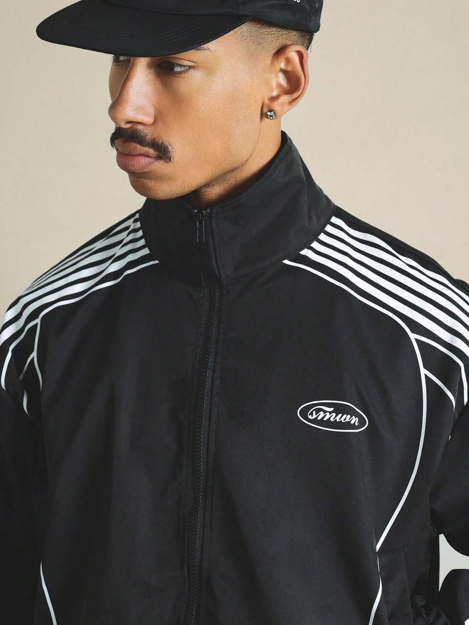 Oversized Windbreaker Track Jacket With Full Zip Closure Stripe Detail And Elastic Hem For Casual Streetwear
