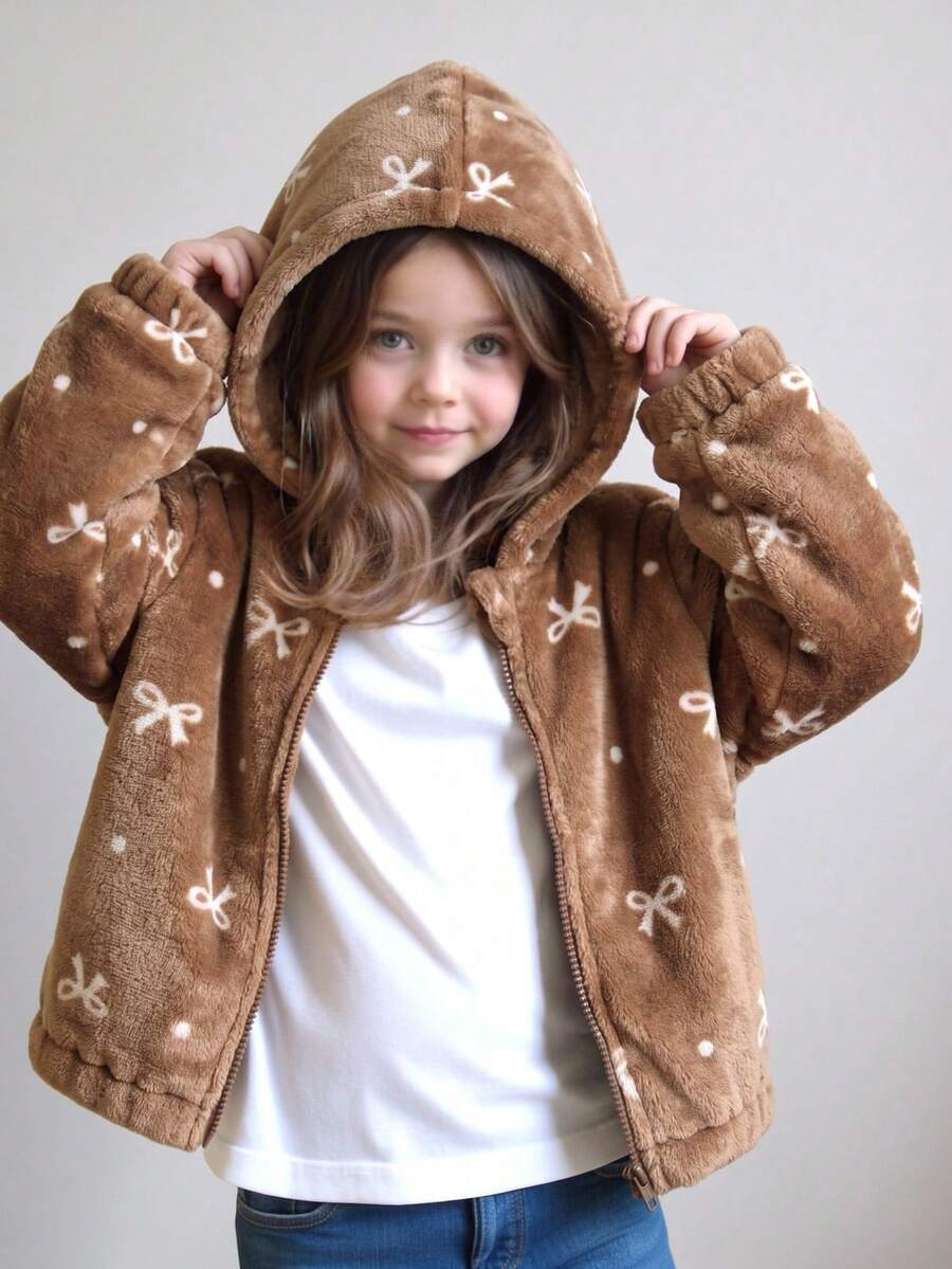 SHEIN Jaket Anak Perempuan Bergaya Manis, Lembut, dan Imut Warna Kopi, Terbuat dari Kain Mewah dengan Sentuhan Lembut, Motif Pita Putih dan Polkadot di Seluruh Permukaan, Desain Tudung yang Menutupi Seluruh Bagian Depan Ukuran S - Coklat - View 1