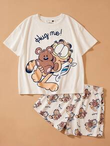 GARFIELD | SHEIN طقم بيجامة نسائية مكون من ملابس علوية كم قصير مطبوعة برسوم كرتونية وشورت - أبيض - مشاهدة 1