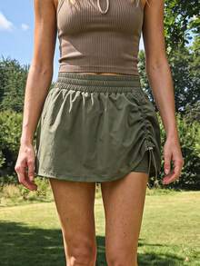 Exploreva Exploreva Women's Solid Color Elastic Waist Side Drawstring Outdoor Skorts - Army Green - View 1