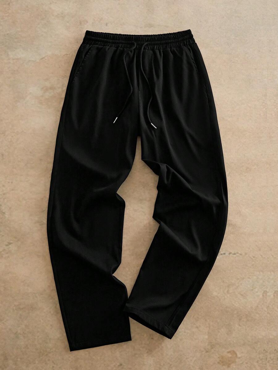 HIMLAND Pantalones largos de unicolor versátiles y casuales para hombres para ir al trabajo - Negro - Ver 1