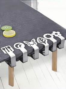 Madebyblanc Nuevos sujetadores de mantel de acero inoxidable con diseño, sujetadores elásticos creativos de formas múltiples para manteles de mesas rectangulares, redondas y de exterior, sujetadores antideslizantes y ajustables para cubrir mesas, para uso doméstico, de fiesta y de picnic, clips decorativos y funcionales para asegurar la mesa en diseños surtidos (set de 8-12), clips reutilizables fáciles de usar para mantener el mantel ajustado y ordenado, regalo perfecto para inauguración de casa y anfitriones. - Multicolor - View 1