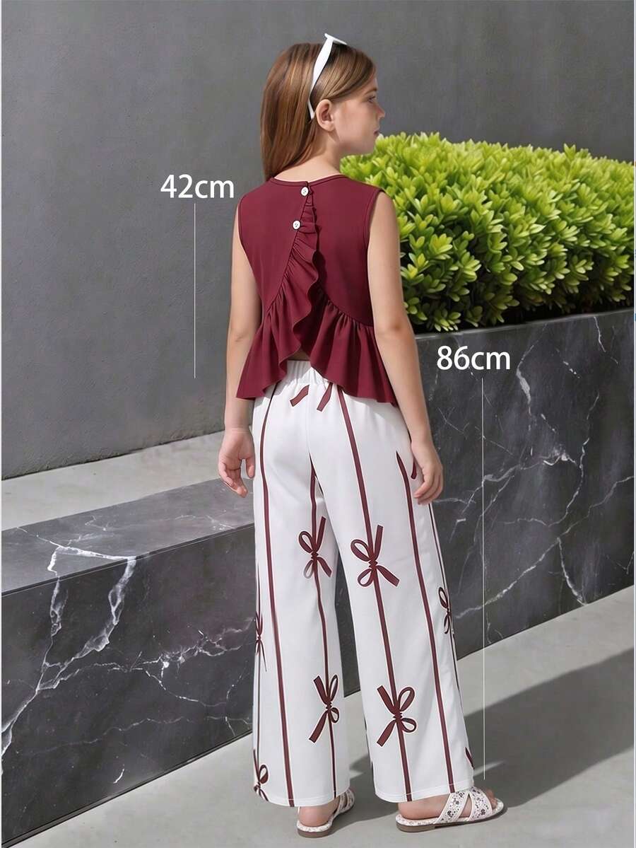 两件套女童无袖荷叶边露背上衣搭配蝴蝶结印花长裤夏季套装，休闲百搭，适合度假、外出、购物、通勤等场合。