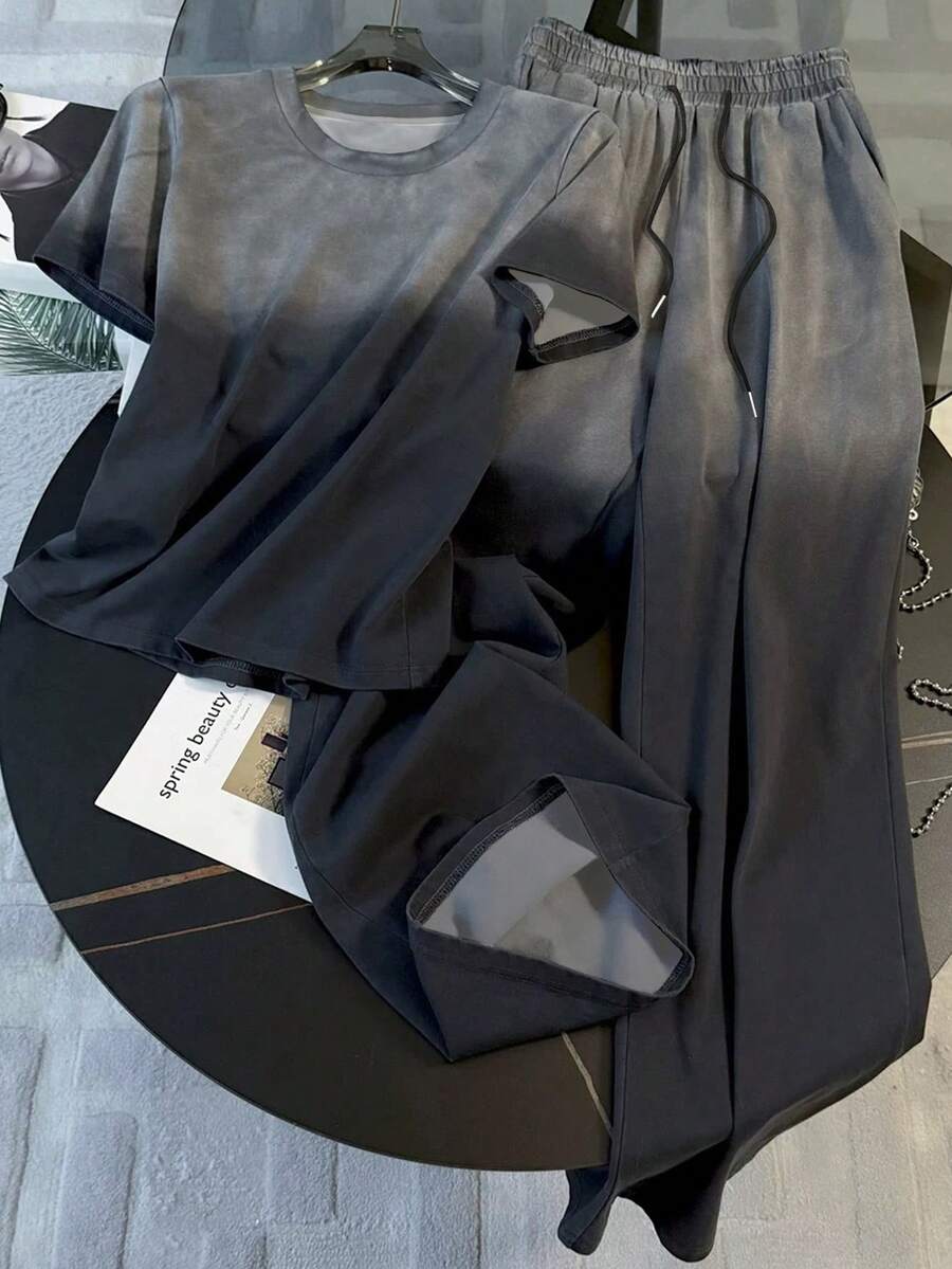 Resyla Camiseta de manga corta con cuello redondo de ajuste regular + Pantalones de pierna recta con bolsillos en diagonal