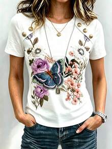 SHEIN Franclia White Short Sleeve T-Shirt, Featuring Heavy Embroidery Of Flowers And Birds As The Core Highlight, Vivid Blue Butterfly And Pink-Purple Floral Patterns With Rich Layers And Exquisite Detail. Metal Buckle Design On Shoulder Line Adds A Crisp Texture, Slim Fit Paired With Curved Hem, Simple Yet Elegant, Easily Enhancing The Sophistication Of Daily Outfits. - Multicolor - View 1