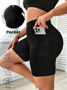 Easithlete Shorts deportivos de cintura alta de unicolor con bolsillos para mujer de talla grande - Negro - Ver 1